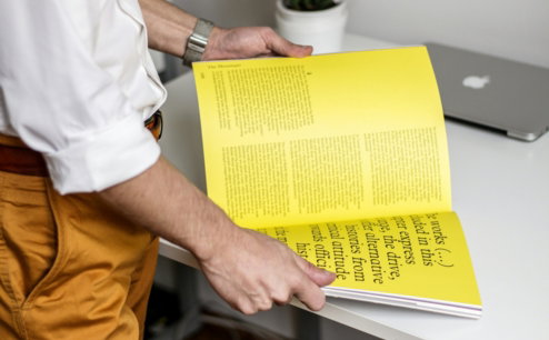 person holding book
